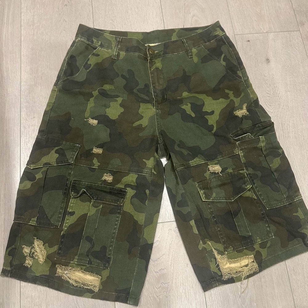 Distressed camo shorts